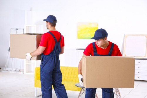 Man And Van Epsom team sorting recyclable items during a sustainable removal