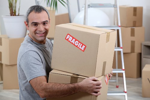 Moving boxes and packing supplies prepared for a local Epsom home move