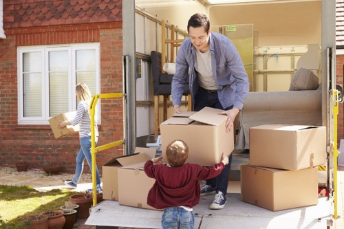 Commercial moving team preparing office equipment for relocation in Epsom