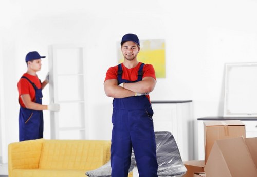 Removal team planning a flat move in Epsom town centre