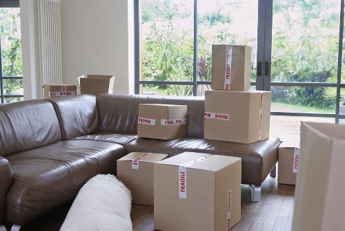 Packed office equipment ready for relocation in an Epsom commercial move